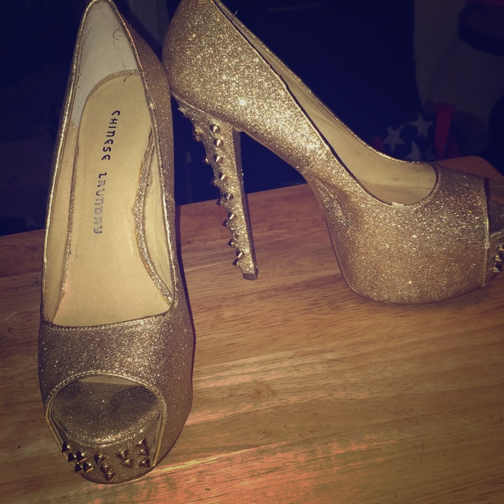 Gold glitter spiked heels